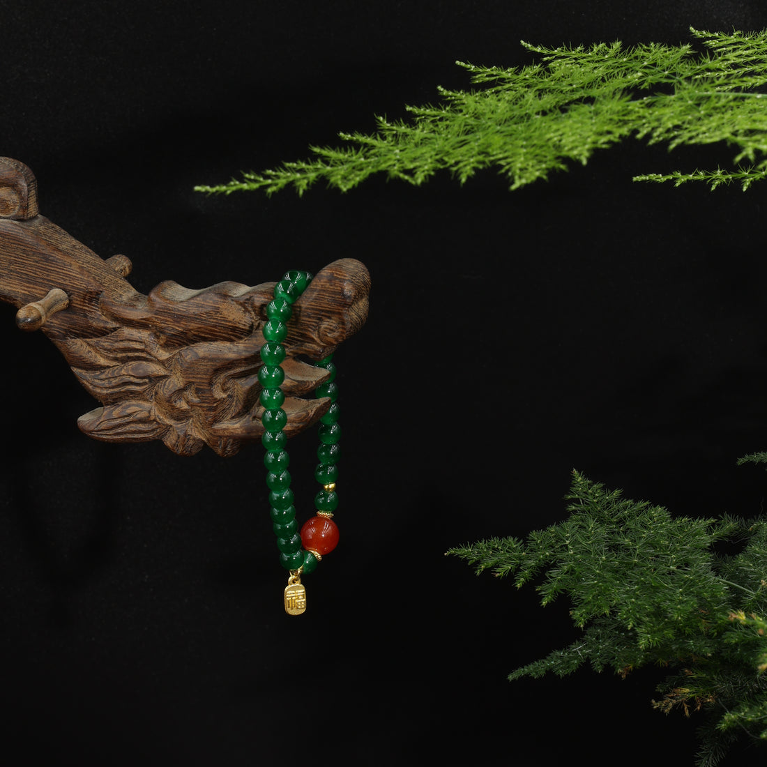 Nephrite "Fu" bead jewelry continuing Ming dynasty scholar's studio tradition
