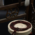 108 smooth sandalwood bead meditation bracelet with natural wood grain for mindfulness practice